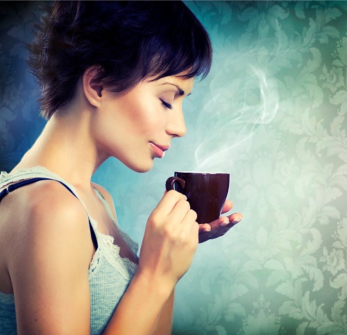 Beautiful Girl With Cup of Coffee