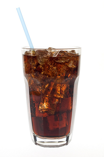 Glass of soda with straw