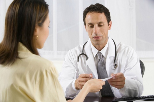 Mulher em consulta médica