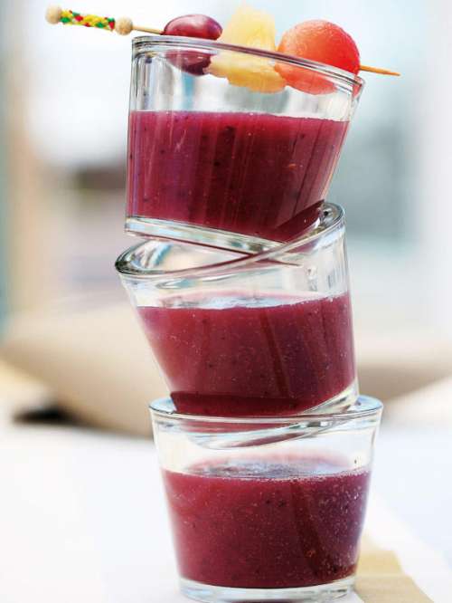 Suco com cereja e laranja