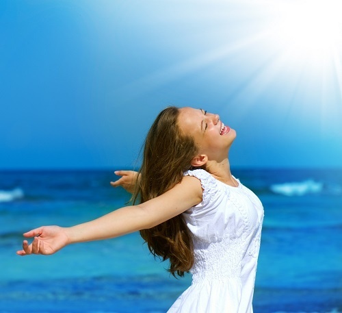 mulher ao sol
