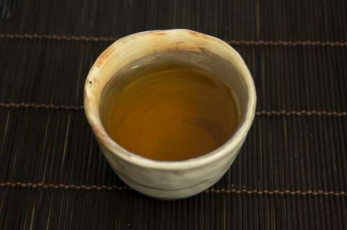 chá-verde e chá-vermelho para digestão de alimentos gordurosos