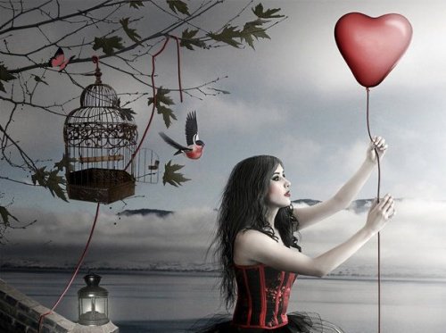 mulher_com_balao_em_forma_de_coracao
