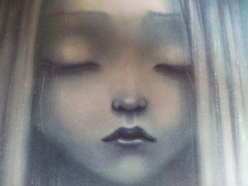 Criança triste devido as suas carências afetivas