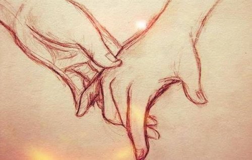 Mãos unidas do casal que compartilha a vida