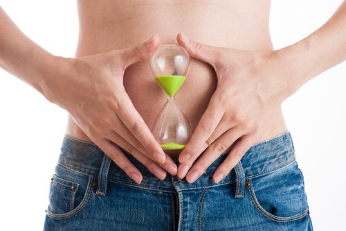 Barriga com relógio