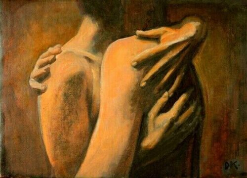 Casal se abraçando devido a oxitocina entre ambos