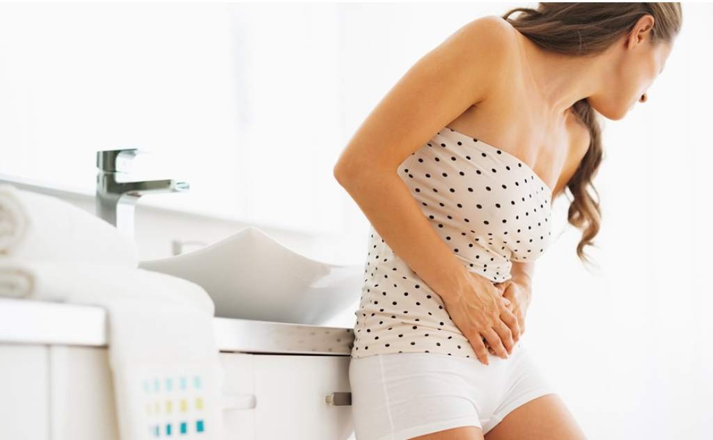 Mulher com doença no trato urinário